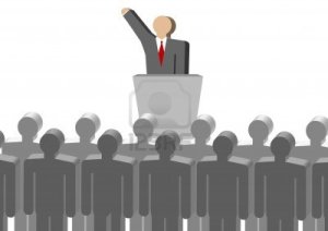 9924899-liderazgo-de-reuniones-un-monton-de-gente-recogiendo-un-hombre-en-el-podio-hablar-hablar-publicidad